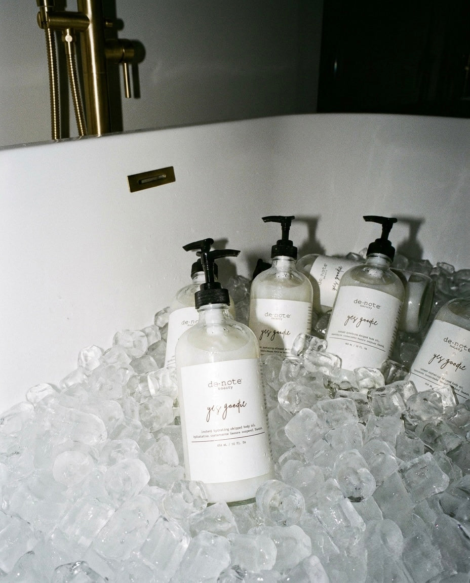 yes goodie bottles set in ice in a hotel bathtub